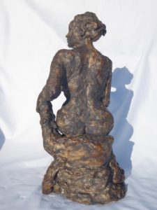 seated figure back