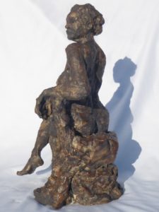 seated figure, side