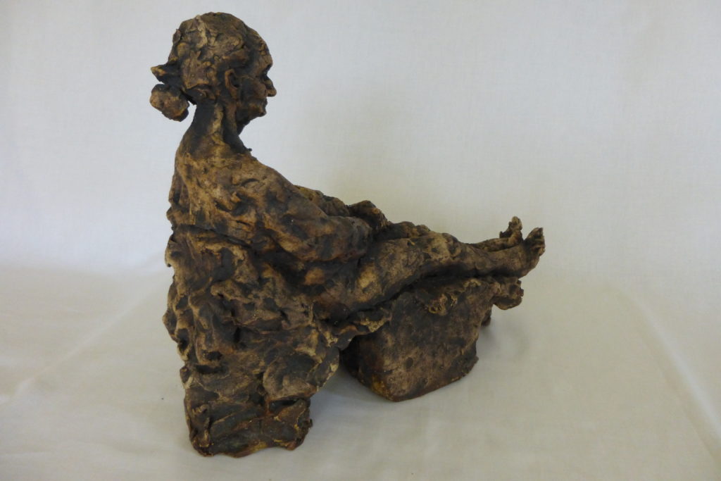 reclining figure, older woman right side