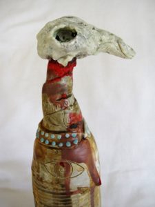 All Wrapped Up- bottle bird skull sculpture